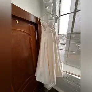 This beautiful dress has only been tried on, never worn.